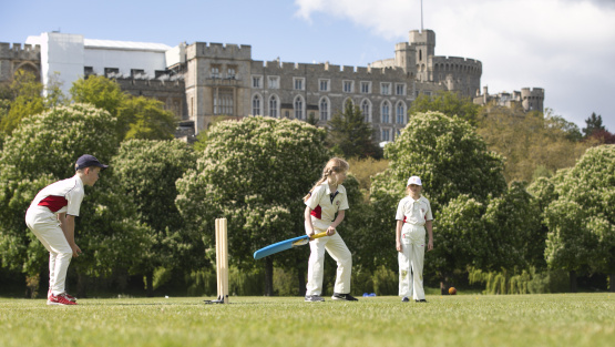 St George&rsquo;s pupils playing cricket on the playing fields overlooked by Windsor Castle