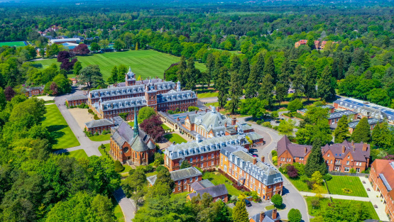 An aerial view of Wellington College, showing the main school buildings and playing fields beyond.