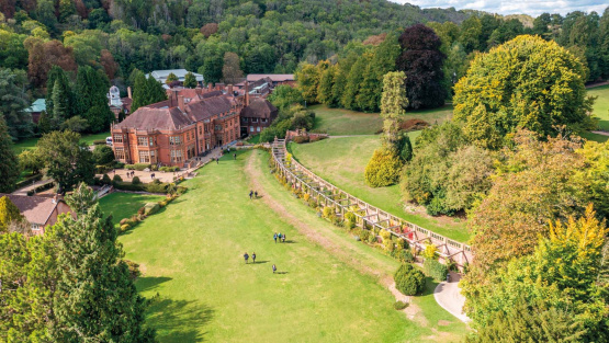 An aerial photograph of the old Woldingham School building and surrounding grounds